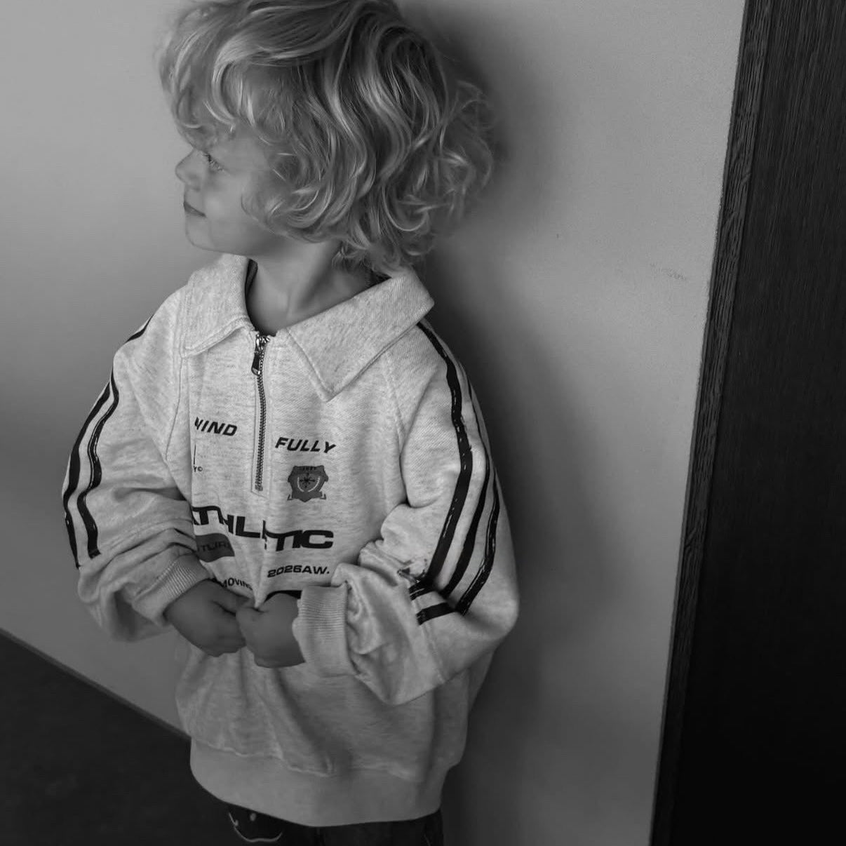 Pull écritures zippé