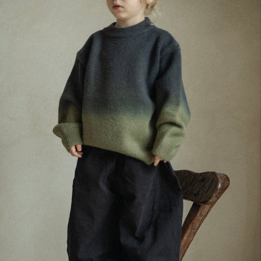 Pull délavé noir et vert