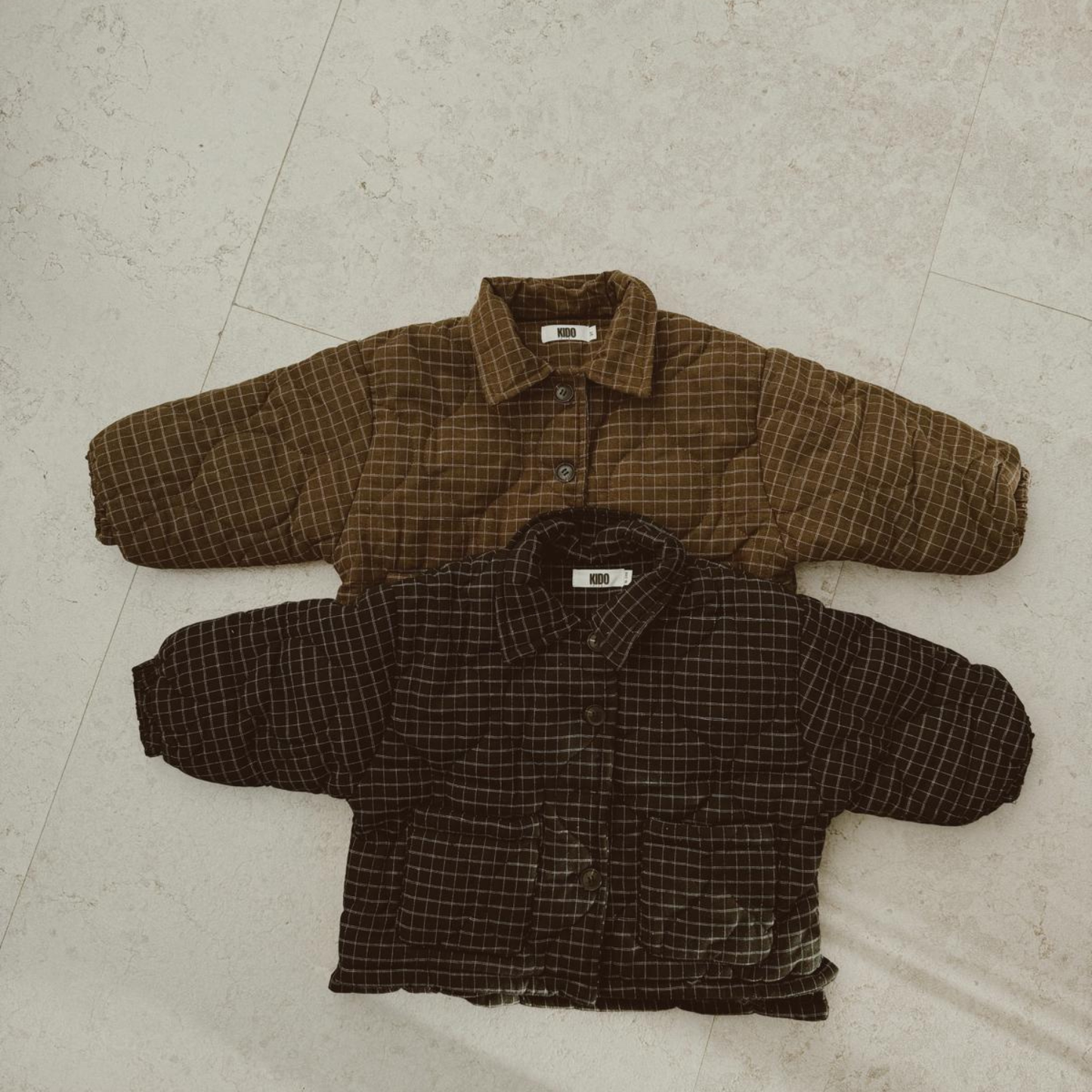 Manteau rembourré à fines lignes